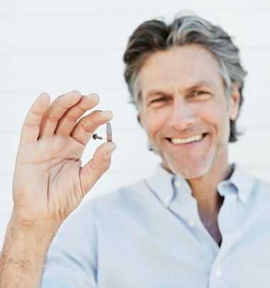 Man with Legend Hearing Aid